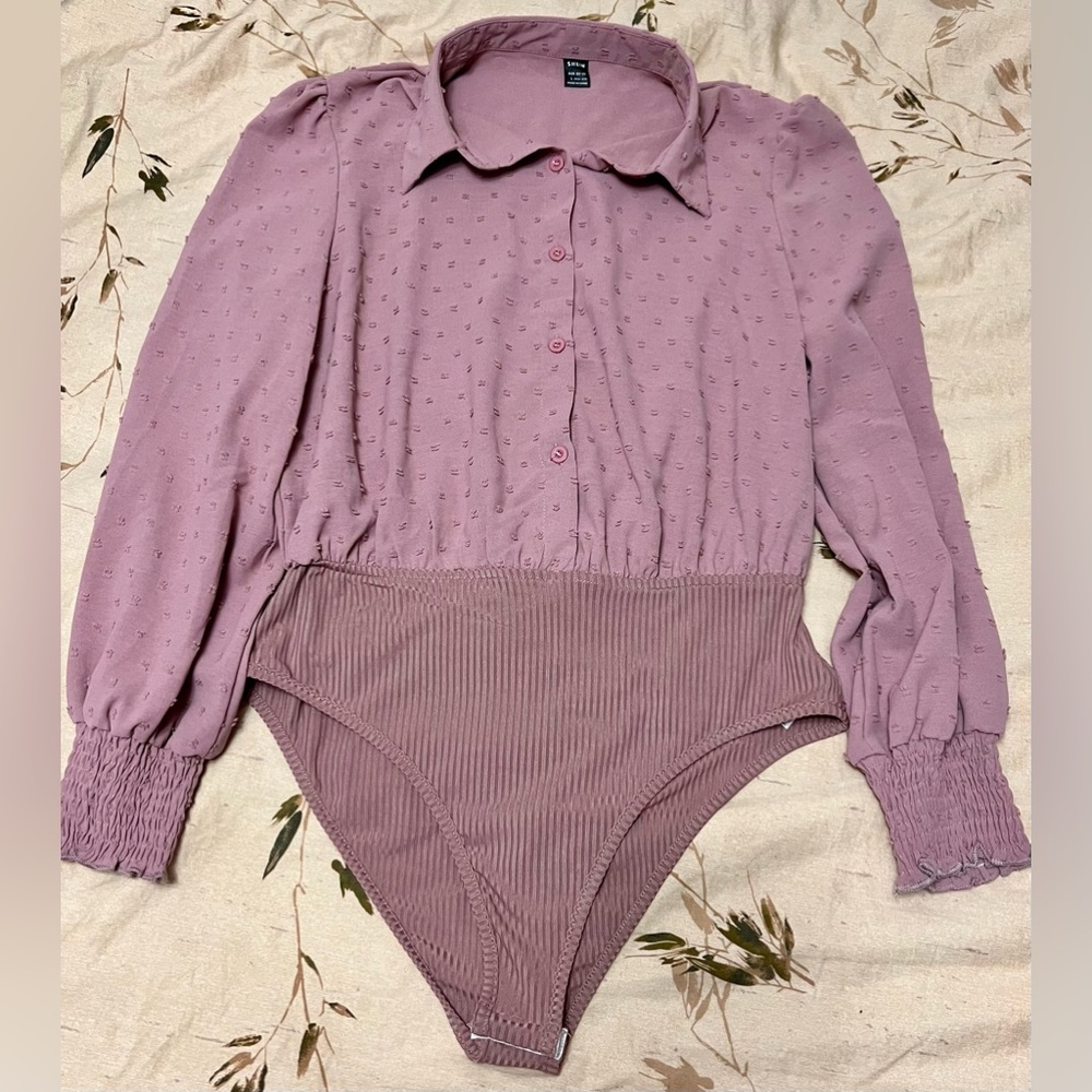 Dusty rose blouse body suit. Cute little flower detailing. Never worn.